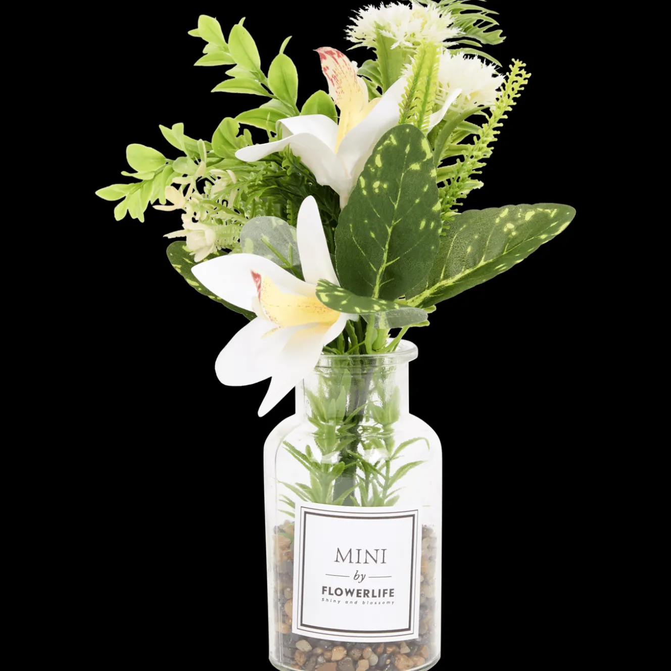 Kunstbloemen in glazen fles